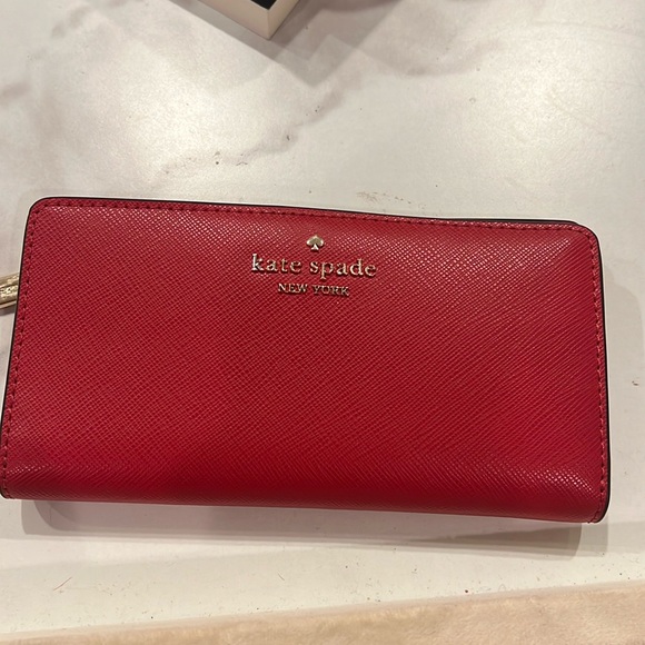 kate spade Handbags - Red Kate Spade checkbook wallet never used great condition
